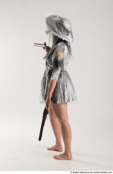 LUCI_AVIOL STANDING POSE WITH TWO GUNS